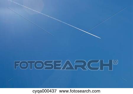 Contrail and clear sky View Large Photo Image Stock Photo - Contrail and clear sky. Fotosearch