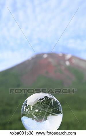 Stock Photo - Crystal globe and Mount Fuji. Fotosearch
