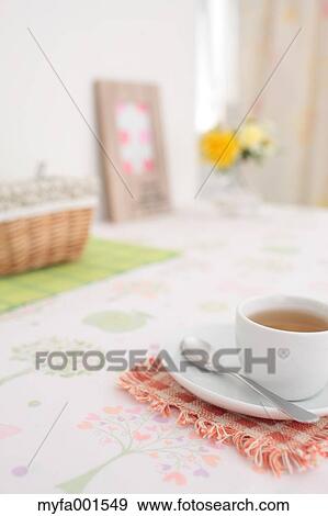 Stock Photo - Cup of tea on a table. Fotosearch