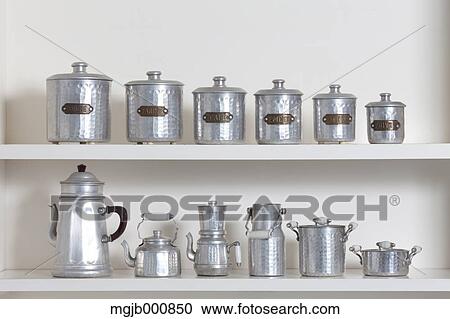 Kitchenware on white shelf View Large Photo Image Stock Image - Kitchenware on white shelf. Fotosearch