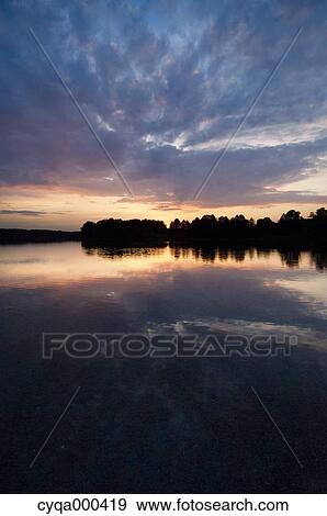 Lake at dusk, Poland View Large Photo Image Stock Photo - Lake at dusk, Poland. Fotosearch