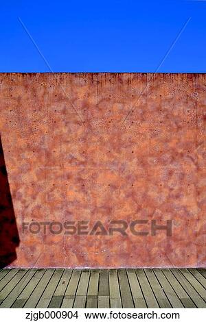Orange wall and wooden floor View Large Photo Image Picture - Orange wall and wooden floor. Fotosearch