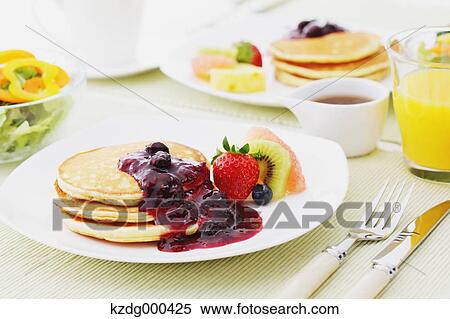 Pancakes and fruits View Large Photo Image Stock Photography - Pancakes and fruits. Fotosearch