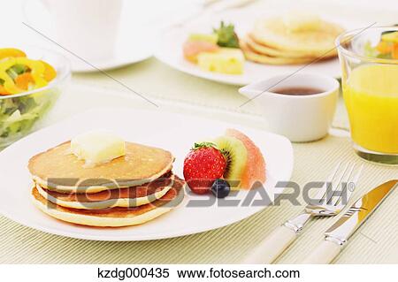 Pancakes and fruits View Large Photo Image Stock Photography - Pancakes and fruits. Fotosearch