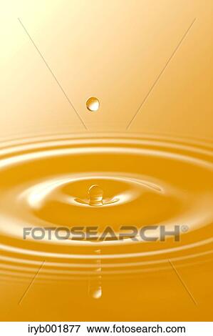 Ripples in orange juice View Large Photo Image Stock Photo - Ripples in orange juice. Fotosearch