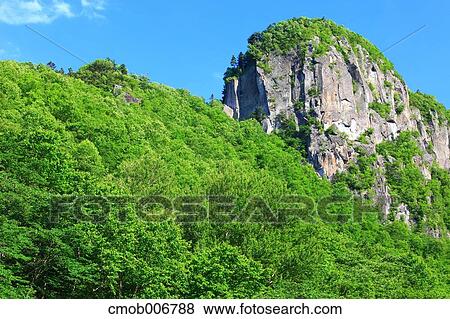 Rock cliff at Taisetsu National Park, Hokkaido View Large Photo Image Stock Photo - Rock cliff at Taisetsu National Park, Hokkaido. Fotosearch