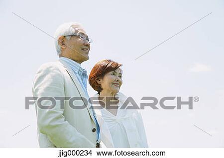 Senior couple smiling away View Large Photo Image Picture - Senior couple smiling away. Fotosearch