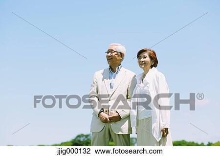 Senior couple smiling away View Large Photo Image Stock Image - Senior couple smiling away. Fotosearch