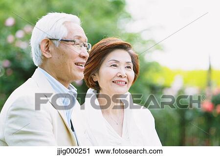 Senior couple smiling away View Large Photo Image Stock Image - Senior couple smiling away. Fotosearch