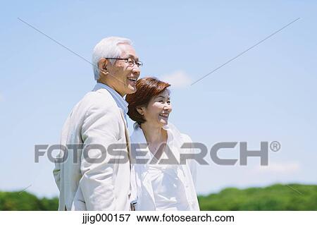Senior couple smiling away View Large Photo Image Stock Photo - Senior couple smiling away. Fotosearch