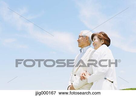 Stock Photo - Senior couple smiling away. Fotosearch