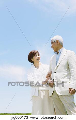 Stock Image - Senior couple smiling. Fotosearch