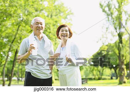 Senior couple with bottled water after training View Large Photo Image Stock Photograph - Senior couple with bottled water after training. Fotosearch