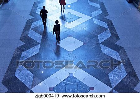 Stock Photo - Silhouette of people walking. Fotosearch