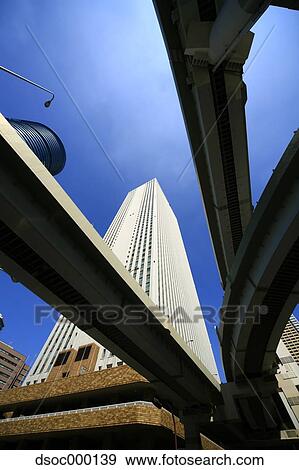 Stock Photo - Skyscrapers and highway, Japan. Fotosearch