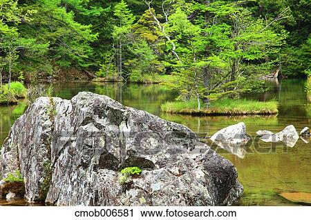 Stone at Pond Myojin, Nagano Prefecture View Large Photo Image Stock Image - Stone at Pond Myojin, Nagano Prefecture. Fotosearch