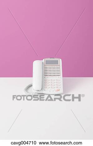 Telephone on desk View Large Photo Image Stock Image - Telephone on desk. Fotosearch