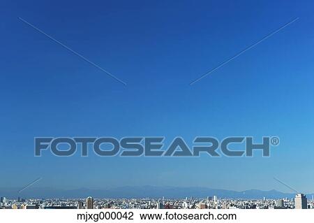 Stock Image - Tokyo cityscape and sky. Fotosearch