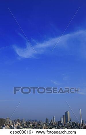 Tokyo cityscape and sky with clouds View Large Photo Image Stock Photo - Tokyo cityscape and sky with clouds. Fotosearch