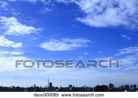 Stock Photography - Tokyo cityscape and sky with clouds. Fotosearch