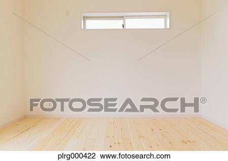 Stock Image - White wall and wooden flooring. Fotosearch