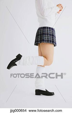 Picture - Woman in high school uniform. Fotosearch