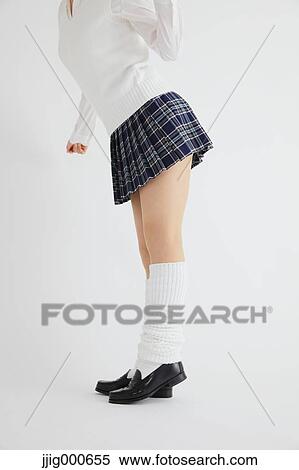 Stock Photography - Woman in high school uniform. Fotosearch