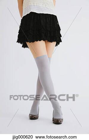 Stock Image - Woman's legs. Fotosearch