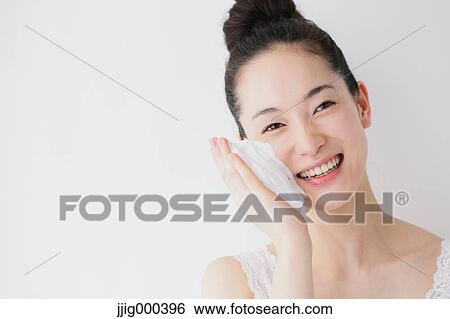 Young woman putting face-wash foam View Large Photo Image Stock Photograph - Young woman putting face-wash foam. Fotosearch