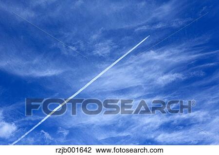 Airplane track and sky with clouds View Large Photo Image Stock Image - Airplane track and sky with clouds. Fotosearch