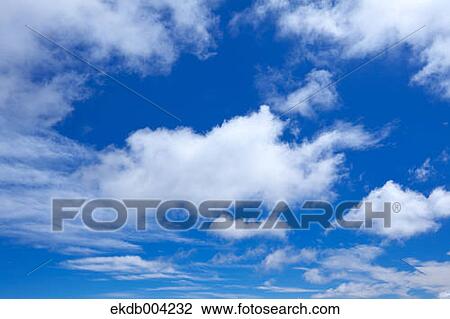 Blue sky with clouds View Large Photo Image Stock Image - Blue sky with clouds. Fotosearch
