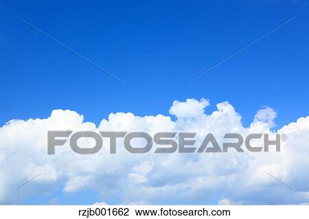 Blue sky with clouds View Large Photo Image Stock Image - Blue sky with clouds. Fotosearch