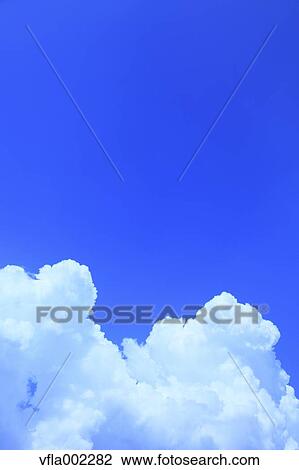 Blue sky with clouds View Large Photo Image Stock Image - Blue sky with clouds. Fotosearch