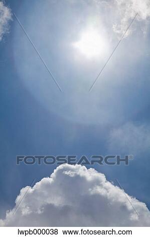Blue sky with clouds View Large Photo Image Stock Photo - Blue sky with clouds. Fotosearch