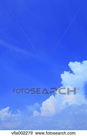 Blue sky with clouds View Large Photo Image Stock Photo - Blue sky with clouds. Fotosearch
