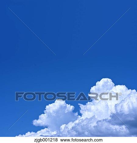 Stock Photo - Blue sky with clouds. Fotosearch