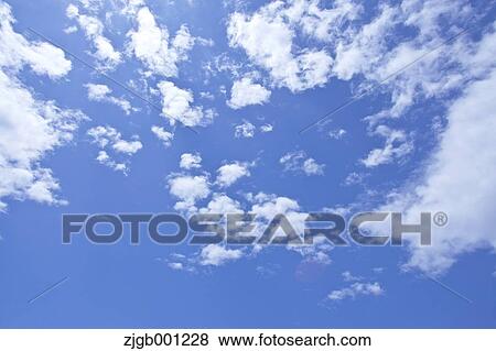 Stock Photo - Blue sky with clouds. Fotosearch