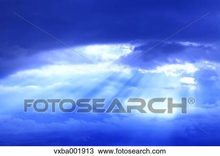 Glow through clouds View Large Photo Image Stock Image - Glow through clouds. Fotosearch