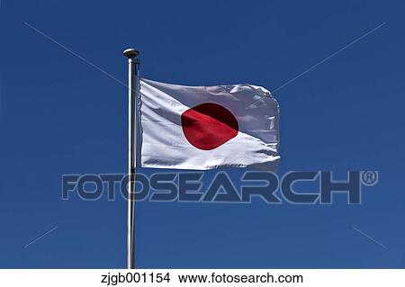 Japanese flag fluttering in the wind View Large Photo Image Picture - Japanese flag fluttering in the wind. Fotosearch