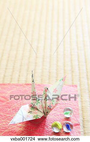 Origami crane and marbles on tatami mat View Large Photo Image Picture - Origami crane and marbles on tatami mat. Fotosearch