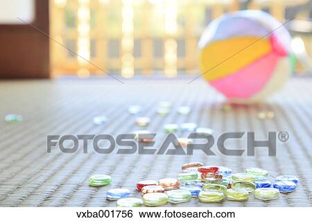 Paper balloon and marbles on tatami mat View Large Photo Image Stock Photograph - Paper balloon and marbles on tatami mat. Fotosearch