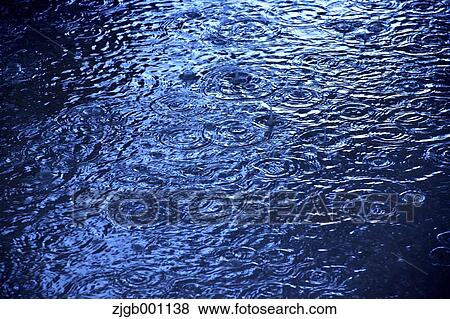 Stock Photo - Rain on sea surface. Fotosearch