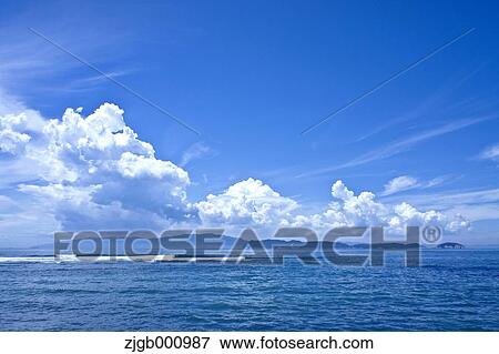 Stock Photo - Sea and summer sky. Fotosearch