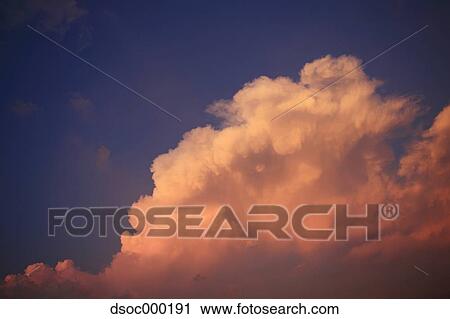 Stock Image - Sky and clouds at sunset. Fotosearch