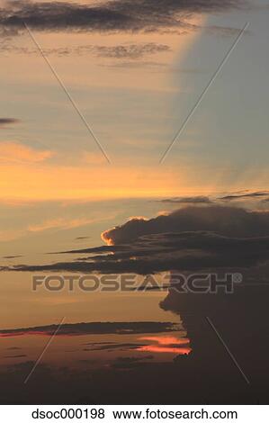 Sky and clouds at sunset View Large Photo Image Stock Photo - Sky and clouds at sunset. Fotosearch