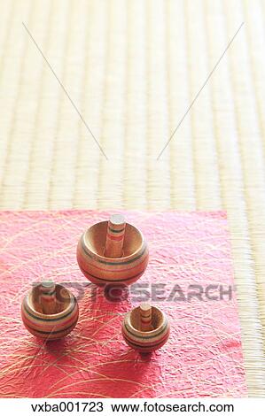 Spinning tops on tatami mat View Large Photo Image Stock Image - Spinning tops on tatami mat. Fotosearch