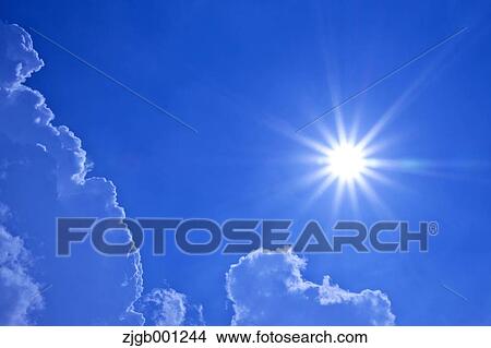 Picture - Sun and blue sky. Fotosearch