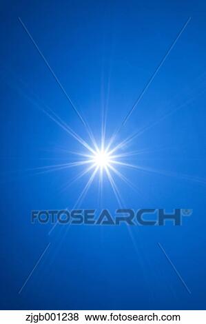 Stock Photo - Sun and blue sky. Fotosearch