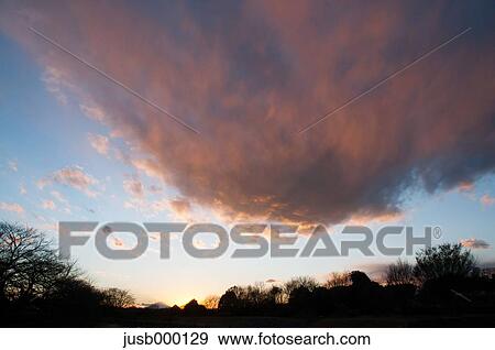 Stock Photo - Sunset clouds. Fotosearch
