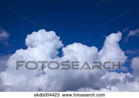 Blue sky with clouds View Large Photo Image Stock Image - Blue sky with clouds. Fotosearch